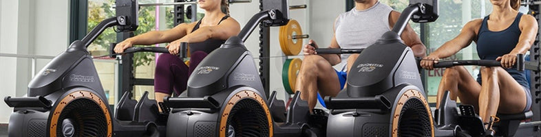 Waarom bedrijfsfitness niet zonder een roeitrainer kan