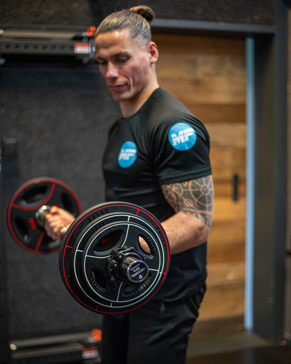 Muscle Power PU 4-Grip Halterschijf - 50 mm - 2,5 kg
